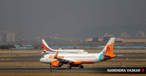 plane lands at Navi Mumbai International Airport