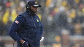 michigan coach moore arrested