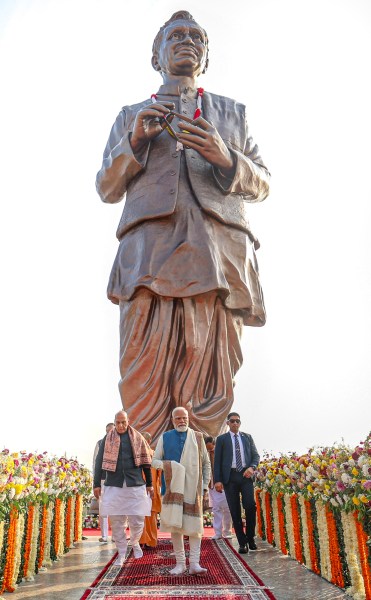 In this image received on Dec. 25, 2025, Prime Minister Narendra Modi with Defence Minister Rajnath Singh and others during the inauguration of 'Rashtriya Prerna Sthal' on the 101st birth anniversary of former prime minister Atal Bihari Vajpayee, in Lucknow. (PMO via PTI Photo)