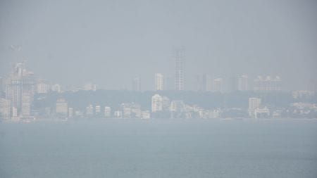 A view of Marine Drive as air pollution engulfs the area, in Mumbai on Friday. (ANI Photo)