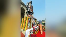 Uttar Pradesh Chief Minister Yogi Adityanath pays floral tribute to the statue of former PM Atal Bihari Vajpayee on his 101st birth anniversary at Lok Bhawan, in Lucknow on Thursday. (@myogiadityanath X/ANI Photo)