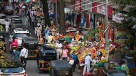 A view of the market area outside Vile Parle station, where hawkers have encroached portions of the footpath as well as the road. (Express photo by Sankhadeep Banerjee)
