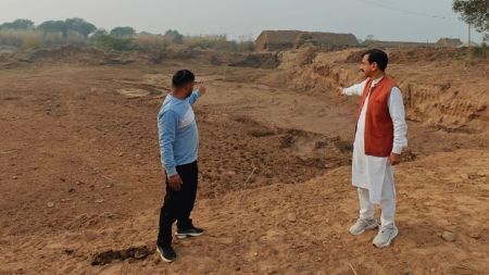 Vineet Joshi points to an alleged mining site in Majri, Mohali district.