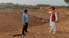 Vineet Joshi points to an alleged mining site in Majri, Mohali district.