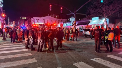 A gunman opened fire inside Brown University’s engineering building during final exams, killing two students and injuring nine others.