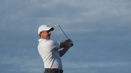 Rory McIlroy plays an approach shot on the 10th hole during the first round of the Australian Open golf tournament in Melbourne, Australia, Thursday, Dec. 4, 2025. (AP Photo)