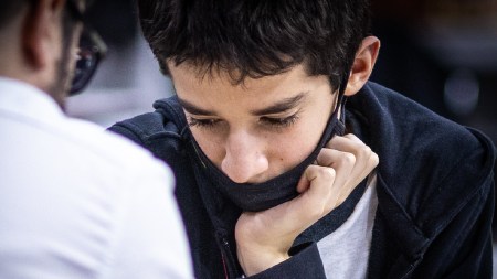 Sergey Sklokin, the 12-year-old who defeated world champion Gukesh in a blitz game on Monday, is seen at the World Blitz Championship in Doha, Qatar. (PHOTO: Anna Shtourman via FIDE)