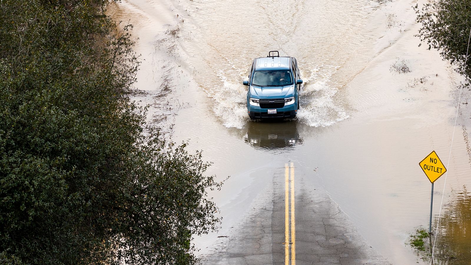 Flash flooding in northern California leads to soaked roads, water rescues and 1 death 