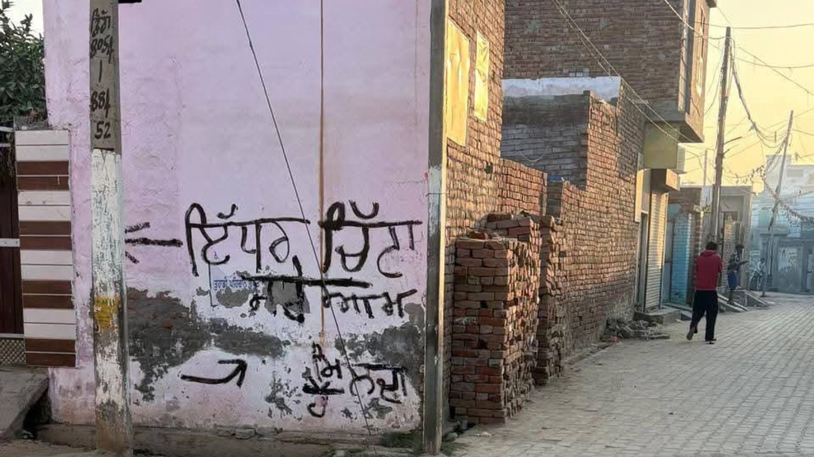 Graffiti highlights drug crisis in Punjab village