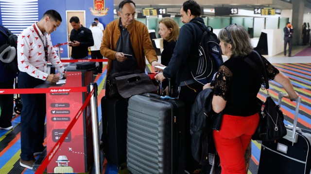 The US State Department on Thursday issued an updated travel alert warning Americans against any travel to Venezuela amid hightened tenstions between the two countries. The State Department said US citizens should cancel any plans to visit Venezuela or remain in the country if they’re already there “due to the high risk of wrongful detention, torture in detention, terrorism, kidnapping, arbitrary enforcement of local laws, crime, civil unrest, and poor health infrastructure.” “All US citizens and lawful permanent residents in Venezuela are strongly advised to depart immediately,” it added. “Do not travel to Venezuela for any reason.” The alert comes amid reports that the Trump administration may be preparing for operations inside Venezuela to force President Nicolas Maduro out. Over the past few months, the US has been ramping up its military presence in the Caribbean, which many see as preparation for an impending land or air operation in the country. The US has deployed an aircraft carrier, warships, and F-35 jets, which the administration says are to target drug cartels. Trump has also authorised covert CIA operations in the country, as part of his pressure campaign against the Maduro government. The exact nature of these operations is classified, but they could involve sabotage, cyberattacks, propaganda, or supporting anti-Maduro groups. Last week, Trump had said that the airspace above and surrounding Venezuela should be considered "closed in its entirety." Trump told military service members last week that the US would "very soon" begin land operations to stop suspected Venezuelan drug traffickers.