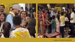 In the viral video, children can be seen welcoming Virat Kohli with red roses