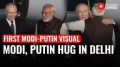 PM Narendra Modi, Russian President Vladimir Putin’s First Meet:  A Hug, Pat & A Handshake!