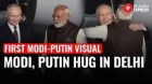 PM Narendra Modi, Russian President Vladimir Putin’s First Meet:  A Hug, Pat & A Handshake!