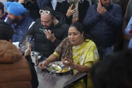 Delhi CM Rekha Gupta, Union Minister Manohar Lal Khattar and others during the inauguration of an 'Atal Rasoi' in New Delhi on Thursday. Express Photo by Tashi Tobgyal 251225