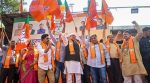 JP Maharashtra President Ravindra Chavan, third right, and party leaders celebrate victory in the Maharashtra local body elections, at the BJP head office, in Mumbai, Sunday, Dec. 21, 2025. (PTI Photo)