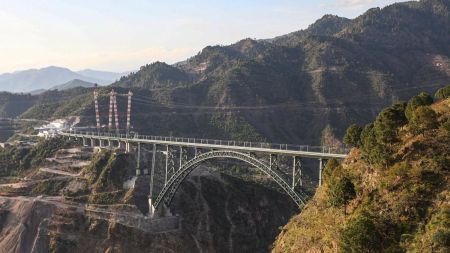 The iconic Chenab Bridge is 1315 m long having Arch span of 467 m and height of 359 m above river bed. (Image: AIR)