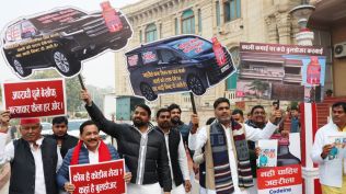 Protests by Samajwadi Party MLAs outside the UP Assembly over the cough syrup racket