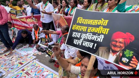 NCP (SP) protest by playing cards in front of district collectorate on Wednesday demanding resignation of Agriculture Minister Manikrao Kokate who was allegedly playing online card games in legislative assembly. Express photographs by Arul Horizon. 23.07.2025, Pune