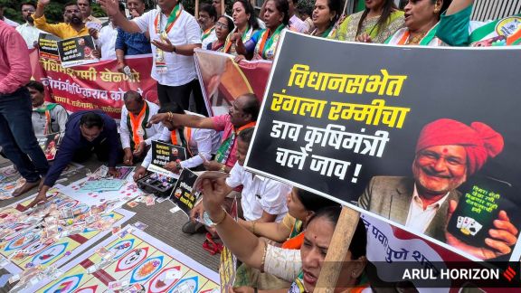 NCP (SP) protest by playing cards in front of district collectorate on Wednesday demanding resignation of Agriculture Minister Manikrao Kokate who was allegedly playing online card games in legislative assembly. Express photographs by Arul Horizon. 23.07.2025, Pune