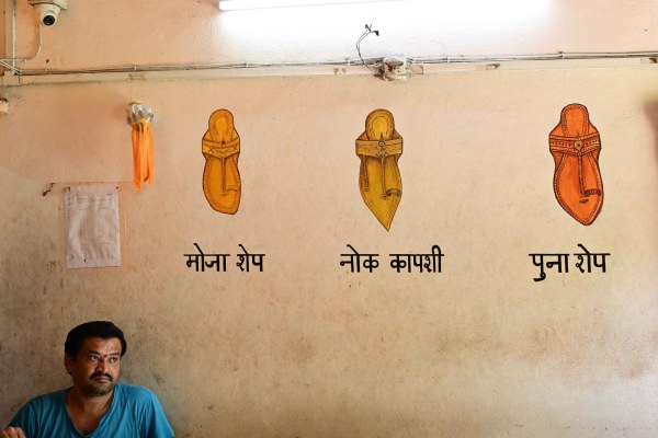 An artist work together on Kolhapuri chappals at Subhash Nagar im Kolhapur. Express Photo by Pavan Khengre, 21.07.25, Pune