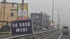 'Go Back Modi' posters at on the side of the road Chakdah