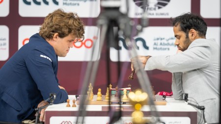 Magnus Carlsen and Arjun Erigaisi in action. (FIDE/Lennart Ootes)