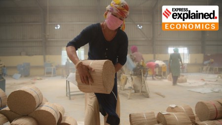 woman labourer at a bamboo stick factory