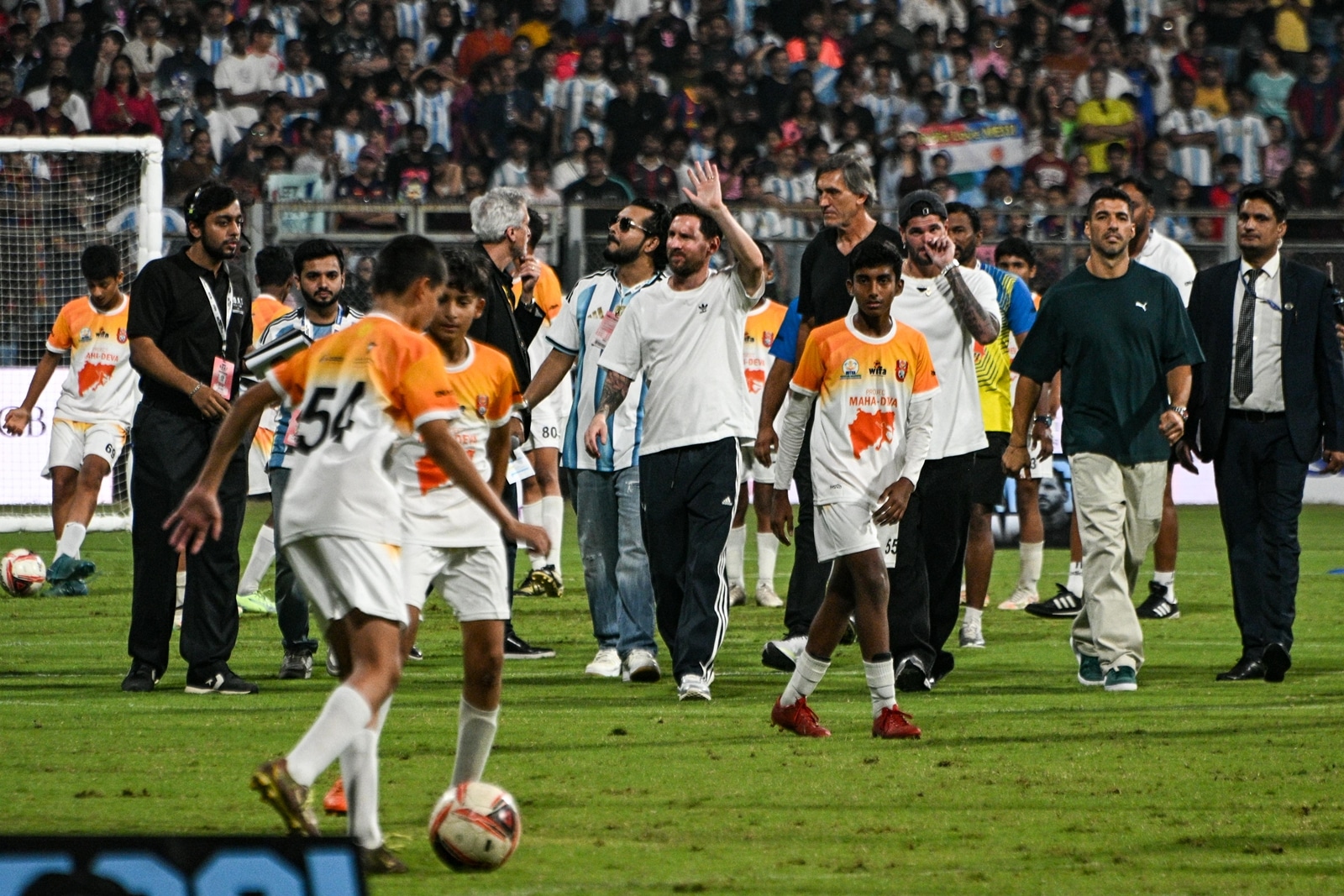 Every seat in every stand was filled, every phone held high, as the Messi made his way around the ground. (Express photo by Sankhadeep Banerjee)