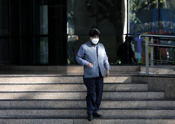 Sadin Kumar Barua, at his work place in Hauz Khas, who is struggling with breathing problems due to pollution, at New Delhi on Thursday, December 12, 2025. Express photo by Abhinav Saha