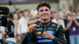 Norris only needed to finish on the podium of the season-ending race to seal the victory and he finished third, behind teammate Oscar Piastri in second and race-winner Verstappen. (AP Photo)