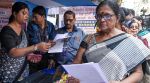 People enrol at a Special Intensive Revision (SIR) of electoral rolls camp at the Sonagachi area, in Kolkata, Tuesday, Dec. 9, 2025. (PTI Photo)