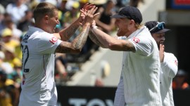 FILE - England's Brydon Carse celebrtes with teammate Ben Stokes. (AP)