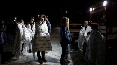 Two students were killed, several injured, and the suspect remains at large as the campus reels from shock.