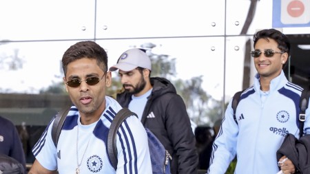 Indias captain Suryakumar Yadav, left, and Abhishek Sharma arrive at Kangra Airport ahead of the third T20 international cricket match between India and South Africa. (PTI Photo)
