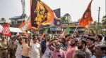 BJP workers celebrate their victory during the Kerala local body polls, at a counting station in Thiruvananthapuram