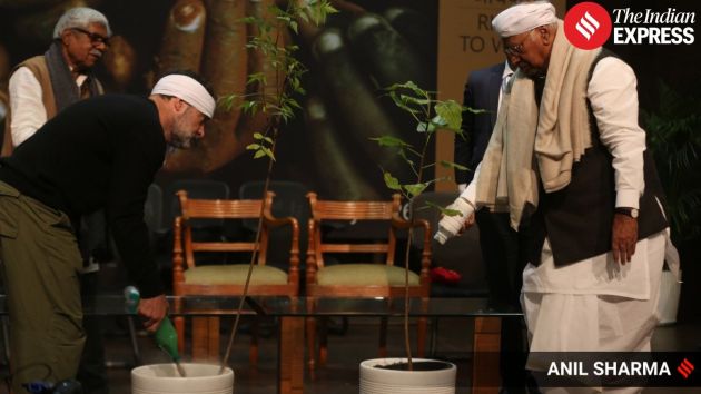 In a symbolic act, workers attending the convention brought soil from their respective work sites