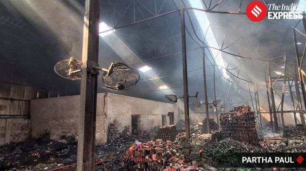 At least seven people were killed and 21 others reported missing after a massive fire tore through a warehouse complex in eastern Kolkata early Monday