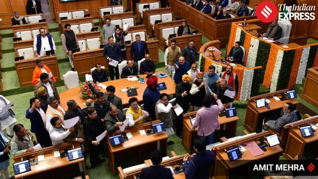 BJP MLAs carrying posters raised slogans against AAP leaders inside the Assembly during the winter session