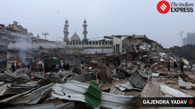 The demolition included structures such as a baraat ghar and a dispensary located beyond the permitted 0.195-acre land area