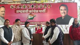 NCP leaders and workers pay tribute to Ajit Pawar at the party office in Delhi on Wednesday. Express