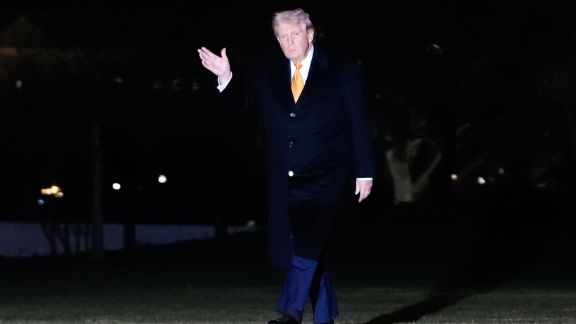 President Donald Trump waves as he walks from Marine One to the White House, Sunday, Jan. 4, 2026, in Washington. (AP Photo)