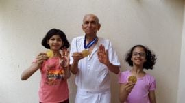 Environmentalist Madhav Gadgil with his granddaughters