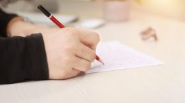 student writing paper