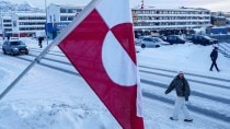 US has always eyed Greenland, Greenland, Trump eyeing Greenland, donald trump, Andrew Jackson, editorial, Indian express, opinion news, current affairsA street in Nuuk displays the Greenlandic national flag. AP