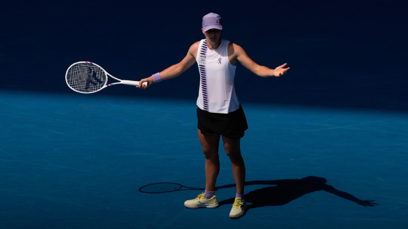 Iga Swiatek of Poland reacts during her quarterfinal match against Elena Rybakina of Kazakhstan at the Australian Open tennis championship in Melbourne, Australia, Wednesday, Jan. 28, 2026. (AP Photo)