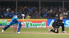 New Zealand spinner Jayden Lennox in action alongside India's Virat Kohli during 3rd ODI in Indore. (PHOTO: AP)