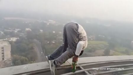 The man was carrying a bag containing beer bottles and a can, which he used during the stunt