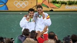 FILE: Former Spanish tennis players Marc Lopez and Rafael Nadal. (PHOTO: Reuters)