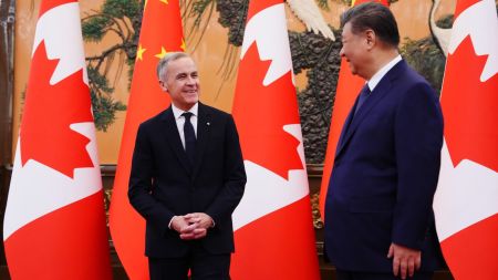 Canada's Prime Minister Mark Carney meets with President of China Xi Jinping at the Great Hall of the People in Beijing, China. (Sean Kilpatrick/The Canadian Press via AP)