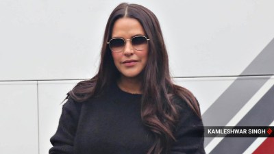 Neha Dhupia posing for photographs in Chandigarh